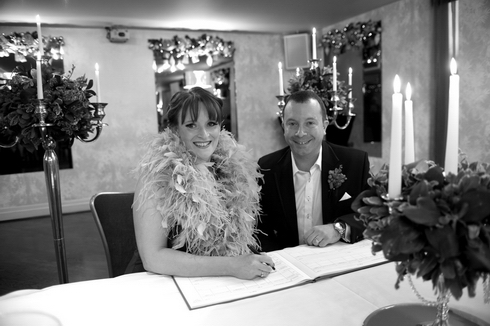 Signing the register at The Vincent Hotel