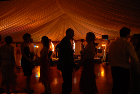 Wedding party and evening guests dance the night away